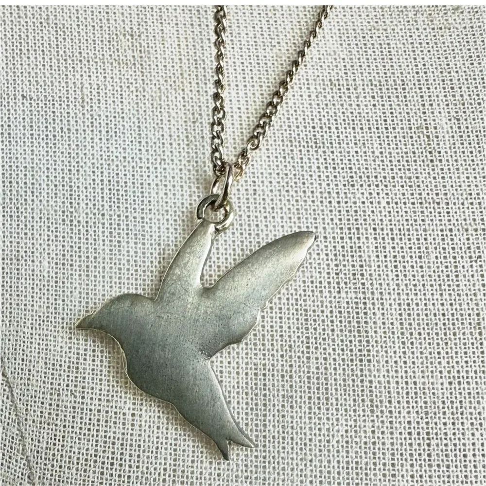 Flying bird pendant necklace